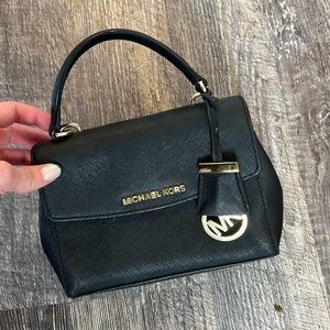 Used MC Mini purse BLACK